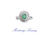 Picture of ANELLO CON SMERALDO 0.41 CT E DIAMANTI