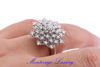 Picture of ANELLO "GIRASOLE" CON DIAMANTI 0,78 CT